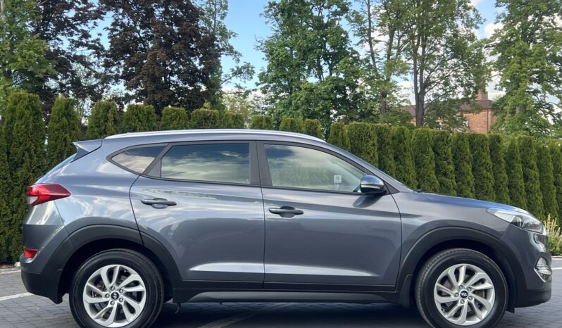 HYUNDAI TUCSON 1.7CRDI 141KM AUTOMAT NAVI KAMERA GRZANE FOTELE SERWISOWANY BEZWYPADKOWY GWARANCJA ZAREJESTROWANY full