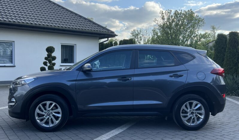 HYUNDAI TUCSON 1.7CRDI 141KM AUTOMAT NAVI KAMERA GRZANE FOTELE SERWISOWANY BEZWYPADKOWY GWARANCJA ZAREJESTROWANY full