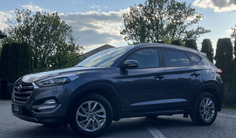 HYUNDAI TUCSON 1.7CRDI 141KM AUTOMAT NAVI KAMERA GRZANE FOTELE SERWISOWANY BEZWYPADKOWY GWARANCJA ZAREJESTROWANY full