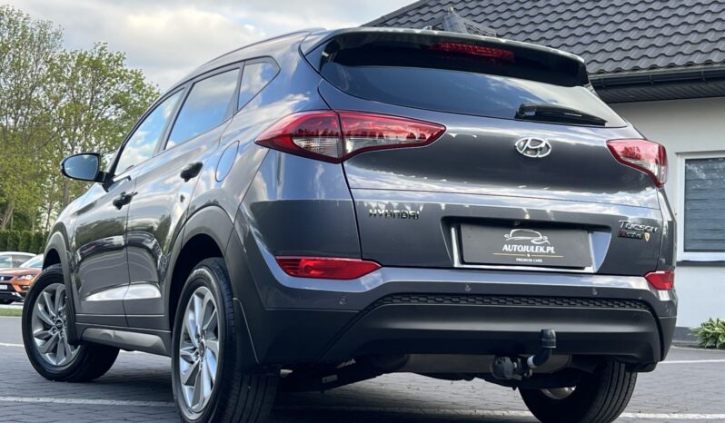 HYUNDAI TUCSON 1.7CRDI 141KM AUTOMAT NAVI KAMERA GRZANE FOTELE SERWISOWANY BEZWYPADKOWY GWARANCJA ZAREJESTROWANY full
