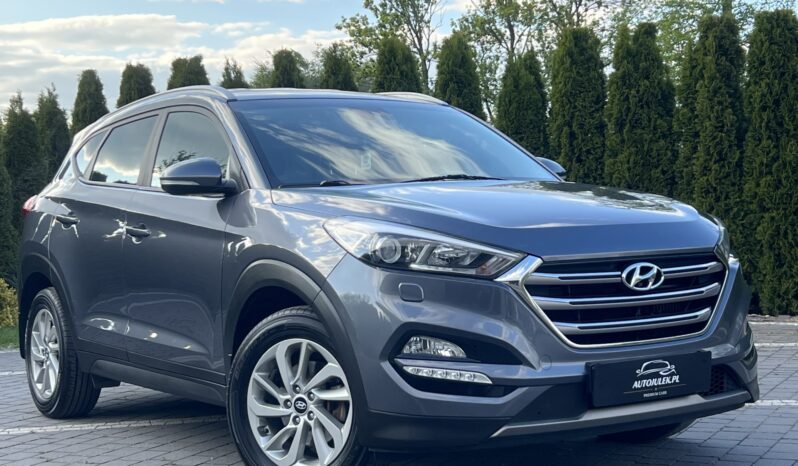 HYUNDAI TUCSON 1.7CRDI 141KM AUTOMAT NAVI KAMERA GRZANE FOTELE SERWISOWANY BEZWYPADKOWY GWARANCJA ZAREJESTROWANY full