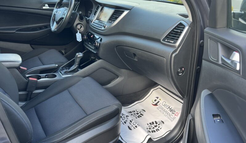 HYUNDAI TUCSON 1.7CRDI 141KM AUTOMAT NAVI KAMERA GRZANE FOTELE SERWISOWANY BEZWYPADKOWY GWARANCJA ZAREJESTROWANY full