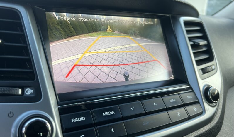 HYUNDAI TUCSON 1.7CRDI 141KM AUTOMAT NAVI KAMERA GRZANE FOTELE SERWISOWANY BEZWYPADKOWY GWARANCJA ZAREJESTROWANY full